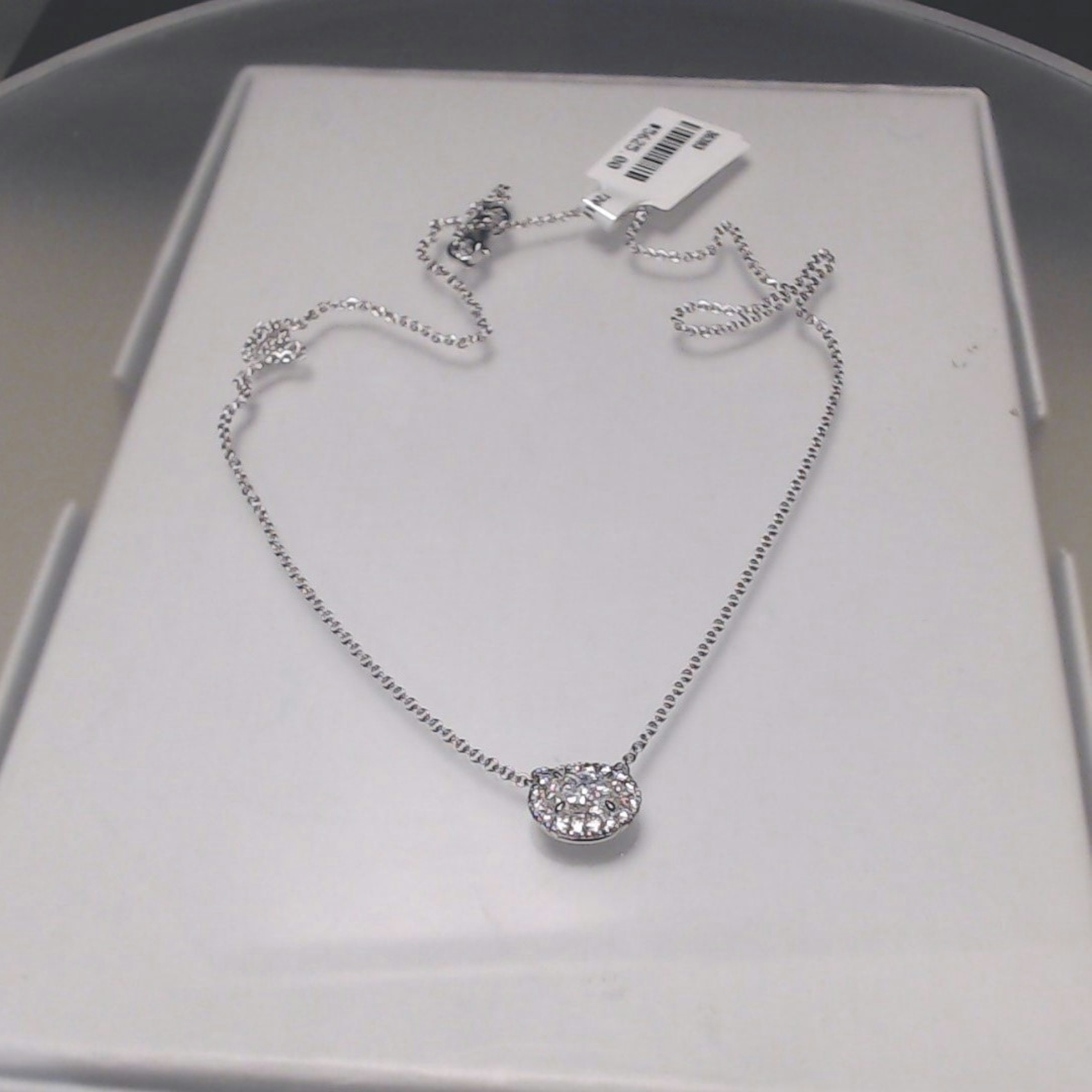 Vertical 18K White Gold Oval Diamond Halo Pendant with Chain