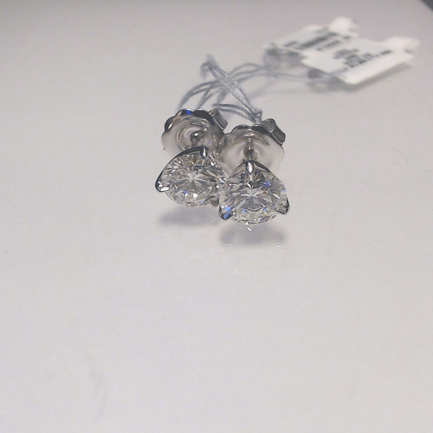 Vertical 18K White Gold Round Diamond Stud Earrings